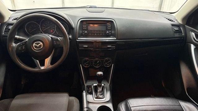 2015 Silver Mazda CX-5 Sport (JM3KE2BE0F0) with an 2.0L I-4 DI DOHC engine, located at 1806 Veterans Memorial Hwy SW, Austell, GA, 30168, (770) 944-9558, 33.817959, -84.606987- Photo#15