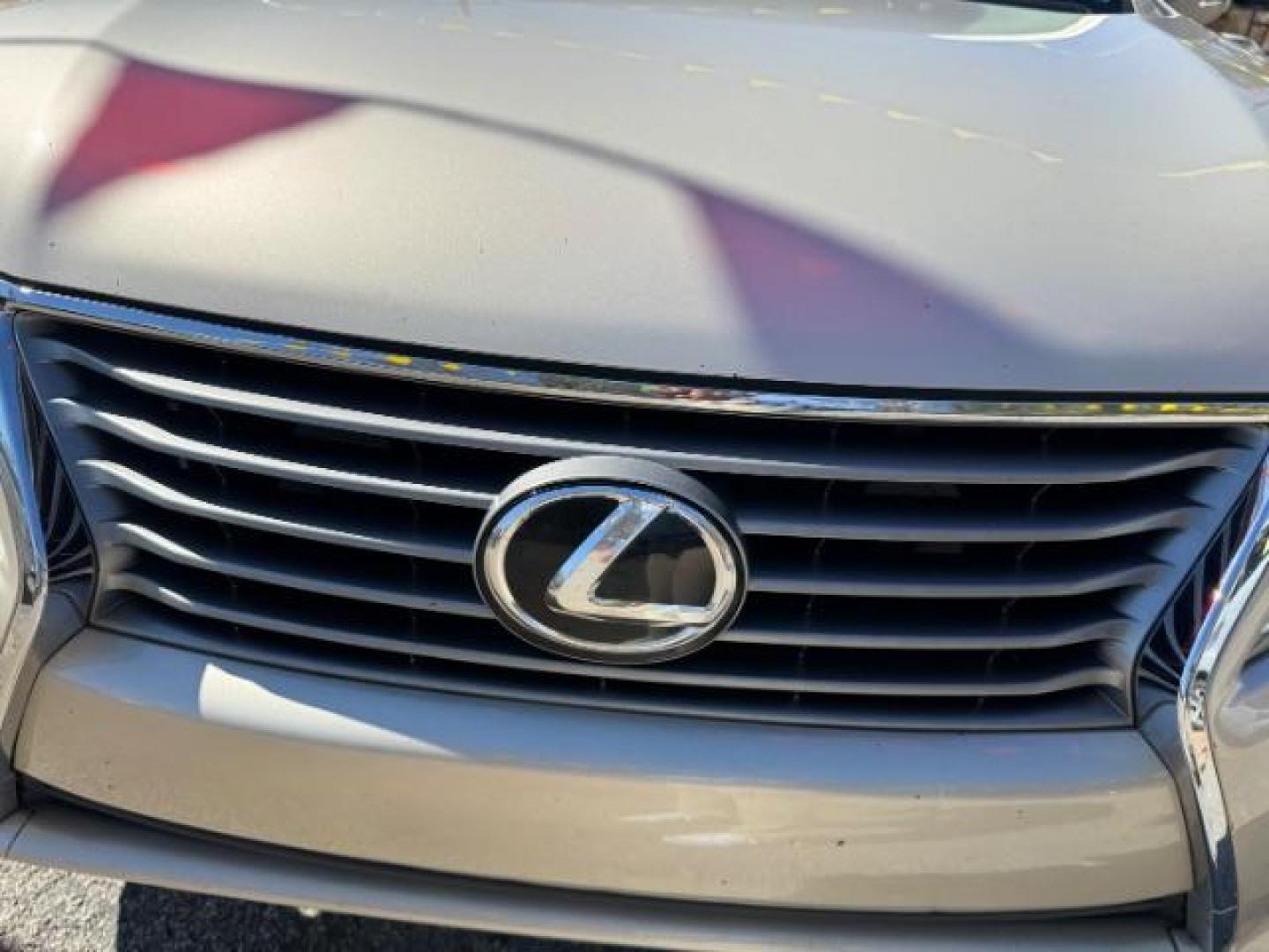 2013 Gold Lexus RX 350 BASE (2T2ZK1BAXDC) with an 3.5L V6 SFI DOHC engine, located at 1806 Veterans Memorial Hwy SW, Austell, GA, 30168, (770) 944-9558, 33.817959, -84.606987 - Photo#17