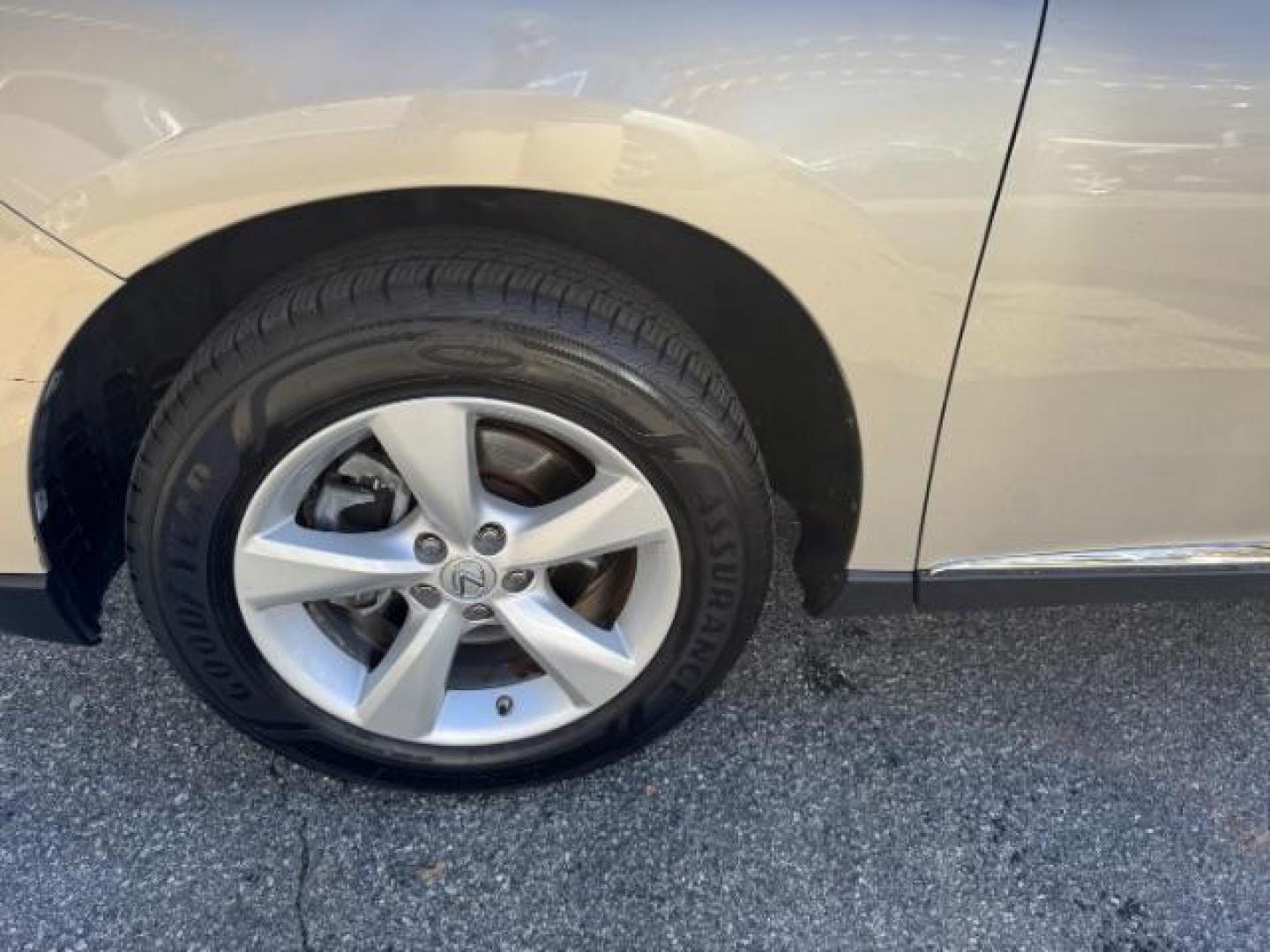 2013 Gold Lexus RX 350 BASE (2T2ZK1BAXDC) with an 3.5L V6 SFI DOHC engine, located at 1806 Veterans Memorial Hwy SW, Austell, GA, 30168, (770) 944-9558, 33.817959, -84.606987 - Photo#19