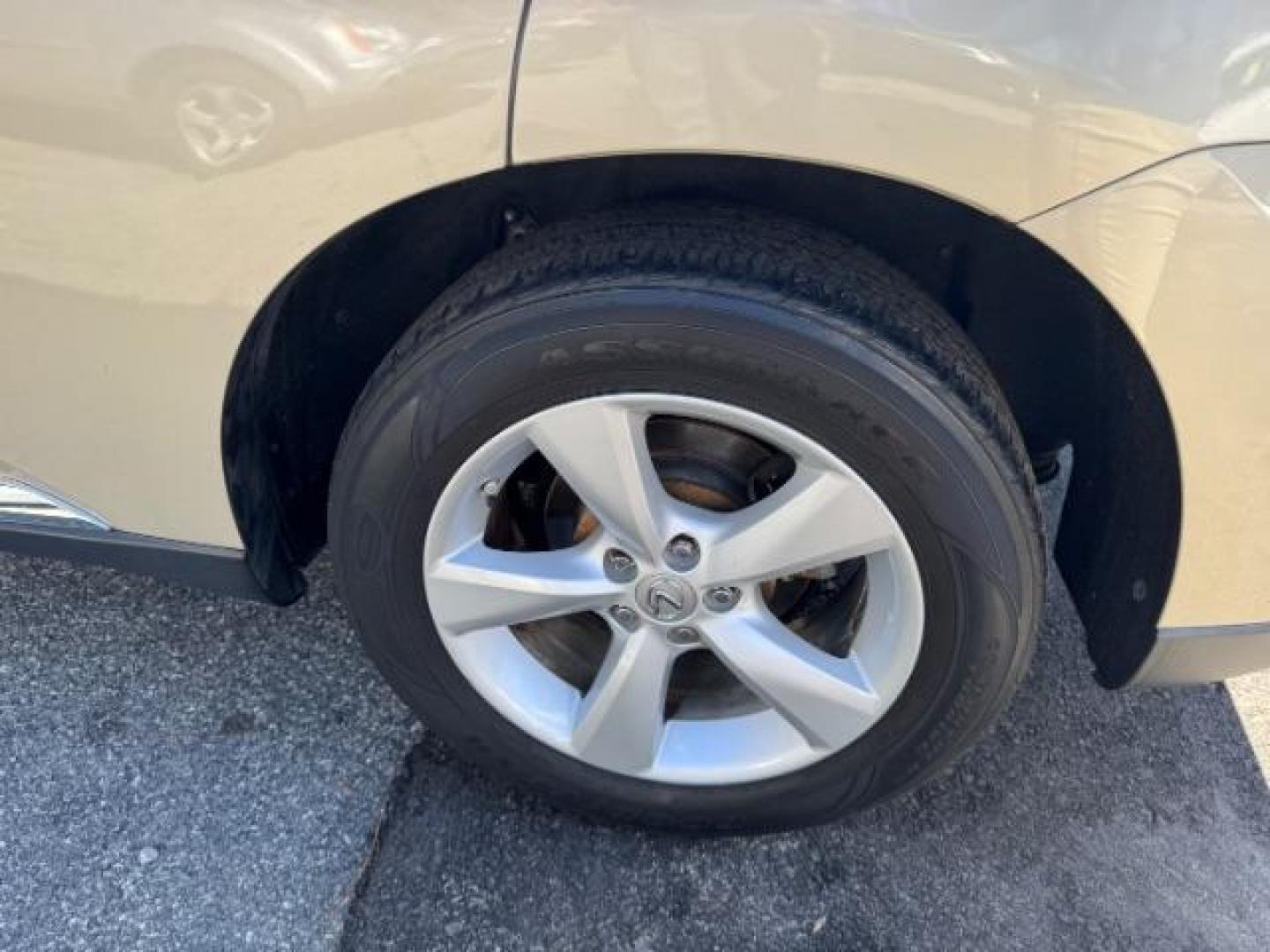 2013 Gold Lexus RX 350 BASE (2T2ZK1BAXDC) with an 3.5L V6 SFI DOHC engine, located at 1806 Veterans Memorial Hwy SW, Austell, GA, 30168, (770) 944-9558, 33.817959, -84.606987 - Photo#20
