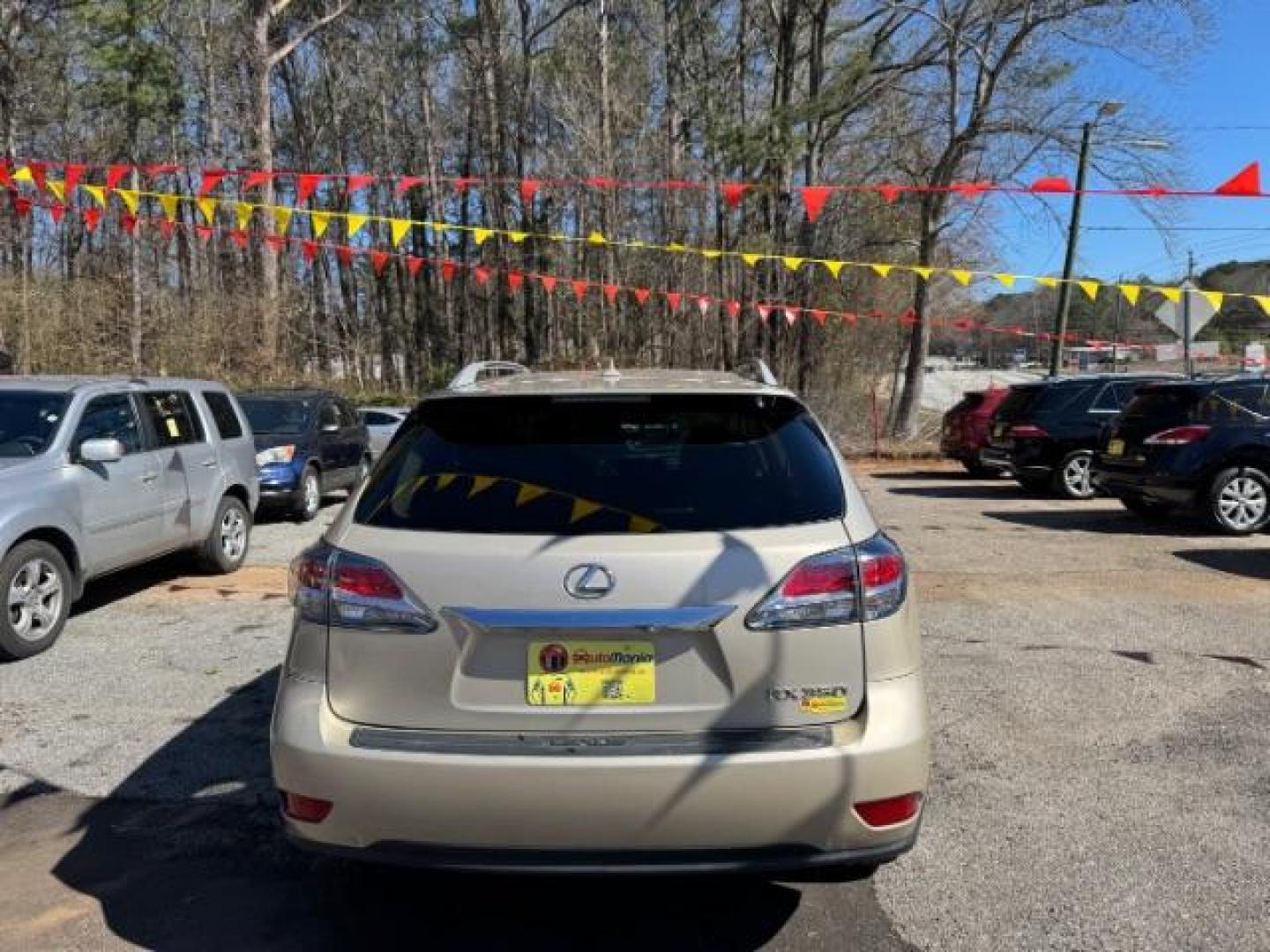 2013 Gold Lexus RX 350 BASE (2T2ZK1BAXDC) with an 3.5L V6 SFI DOHC engine, located at 1806 Veterans Memorial Hwy SW, Austell, GA, 30168, (770) 944-9558, 33.817959, -84.606987 - Photo#4
