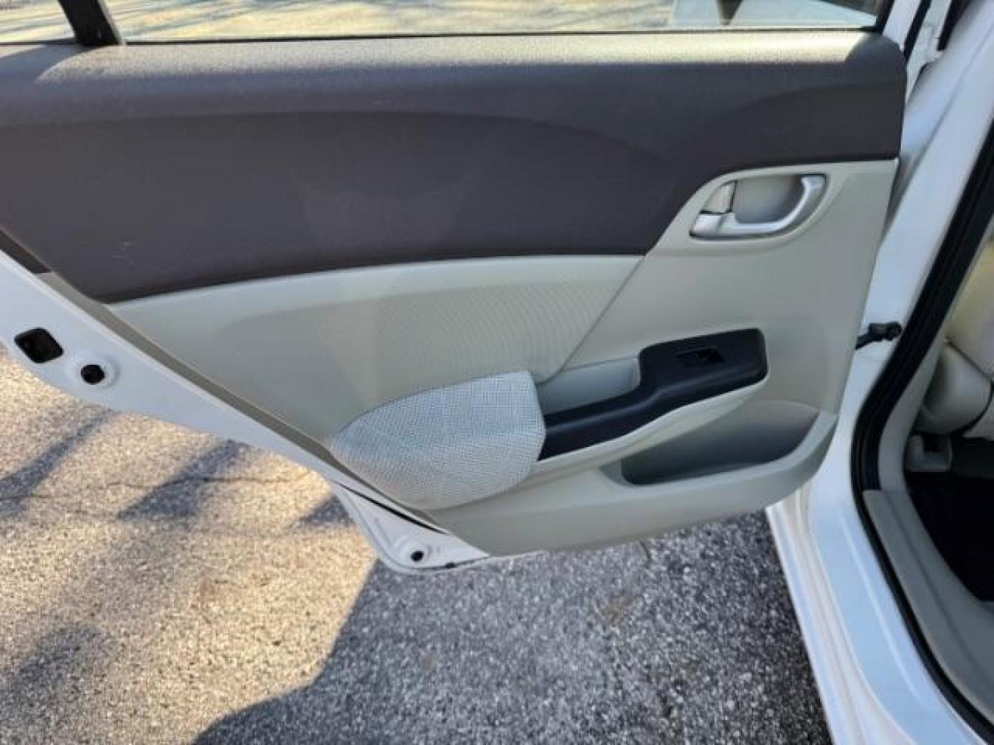 2012 White Honda Civic LX (2HGFB2F59CH) with an 1.8L I-4 MPI SOHC engine, located at 1806 Veterans Memorial Hwy SW, Austell, GA, 30168, (770) 944-9558, 33.817959, -84.606987 - Photo#11