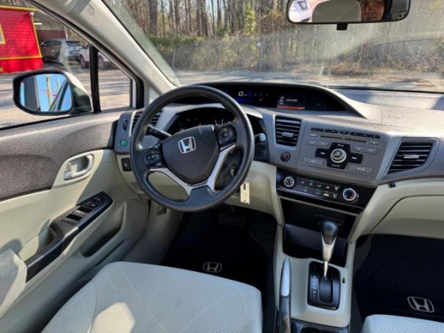 2012 White Honda Civic LX (2HGFB2F59CH) with an 1.8L I-4 MPI SOHC engine, located at 1806 Veterans Memorial Hwy SW, Austell, GA, 30168, (770) 944-9558, 33.817959, -84.606987 - Photo#12