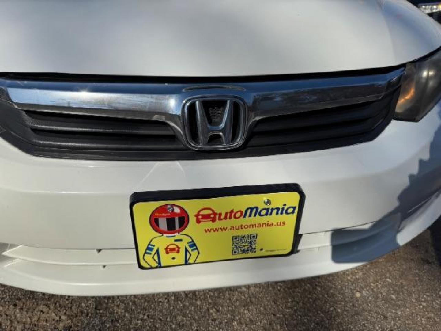 2012 White Honda Civic LX (2HGFB2F59CH) with an 1.8L I-4 MPI SOHC engine, located at 1806 Veterans Memorial Hwy SW, Austell, GA, 30168, (770) 944-9558, 33.817959, -84.606987 - Photo#17