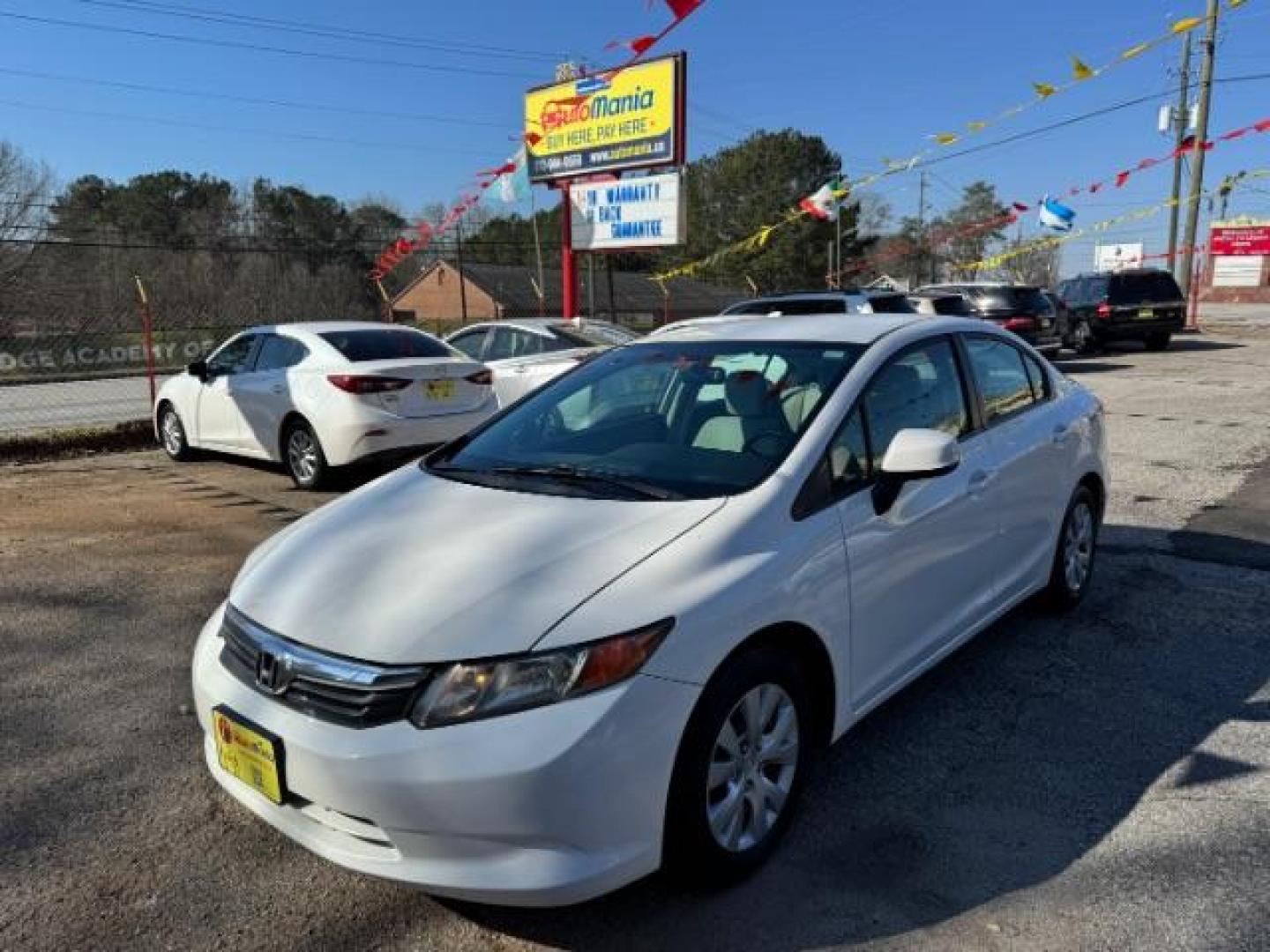 2012 White Honda Civic LX (2HGFB2F59CH) with an 1.8L I-4 MPI SOHC engine, located at 1806 Veterans Memorial Hwy SW, Austell, GA, 30168, (770) 944-9558, 33.817959, -84.606987 - Photo#0