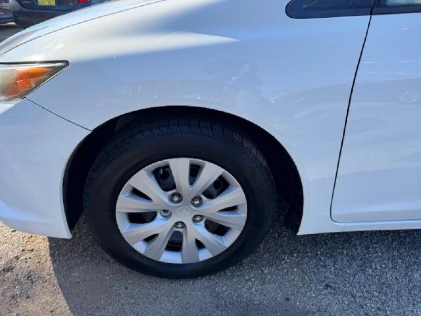 2012 White Honda Civic LX (2HGFB2F59CH) with an 1.8L I-4 MPI SOHC engine, located at 1806 Veterans Memorial Hwy SW, Austell, GA, 30168, (770) 944-9558, 33.817959, -84.606987 - Photo#18