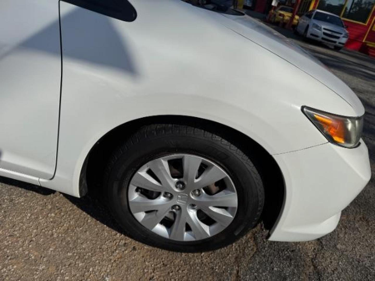 2012 White Honda Civic LX (2HGFB2F59CH) with an 1.8L I-4 MPI SOHC engine, located at 1806 Veterans Memorial Hwy SW, Austell, GA, 30168, (770) 944-9558, 33.817959, -84.606987 - Photo#19