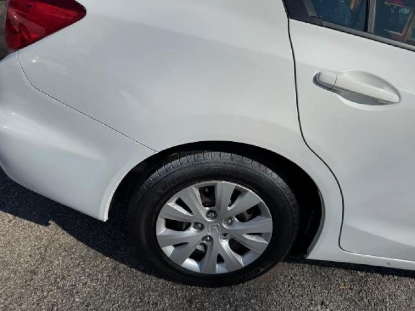 2012 White Honda Civic LX (2HGFB2F59CH) with an 1.8L I-4 MPI SOHC engine, located at 1806 Veterans Memorial Hwy SW, Austell, GA, 30168, (770) 944-9558, 33.817959, -84.606987 - Photo#20