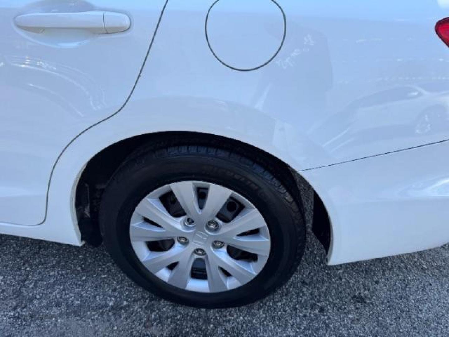 2012 White Honda Civic LX (2HGFB2F59CH) with an 1.8L I-4 MPI SOHC engine, located at 1806 Veterans Memorial Hwy SW, Austell, GA, 30168, (770) 944-9558, 33.817959, -84.606987 - Photo#21