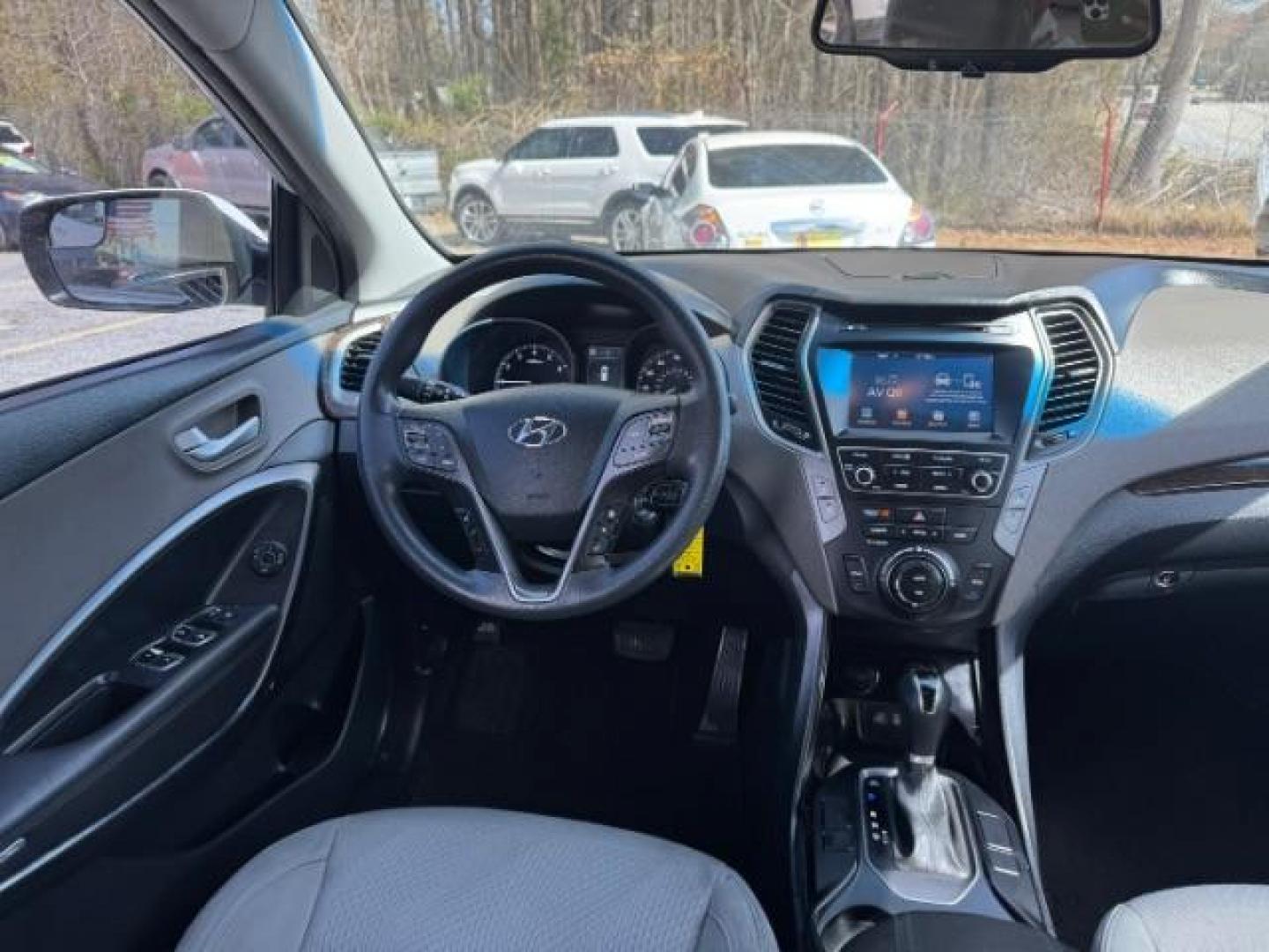 2017 White Hyundai Santa Fe Sport BASE (5NMZU3LB1HH) with an 2.4L I-4 DI DOHC engine, located at 1806 Veterans Memorial Hwy SW, Austell, GA, 30168, (770) 944-9558, 33.817959, -84.606987 - Photo#12