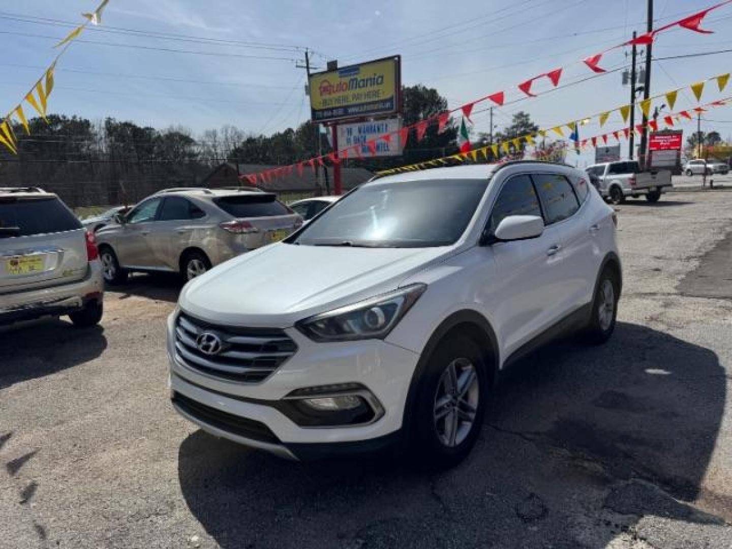 2017 White Hyundai Santa Fe Sport BASE (5NMZU3LB1HH) with an 2.4L I-4 DI DOHC engine, located at 1806 Veterans Memorial Hwy SW, Austell, GA, 30168, (770) 944-9558, 33.817959, -84.606987 - Photo#0
