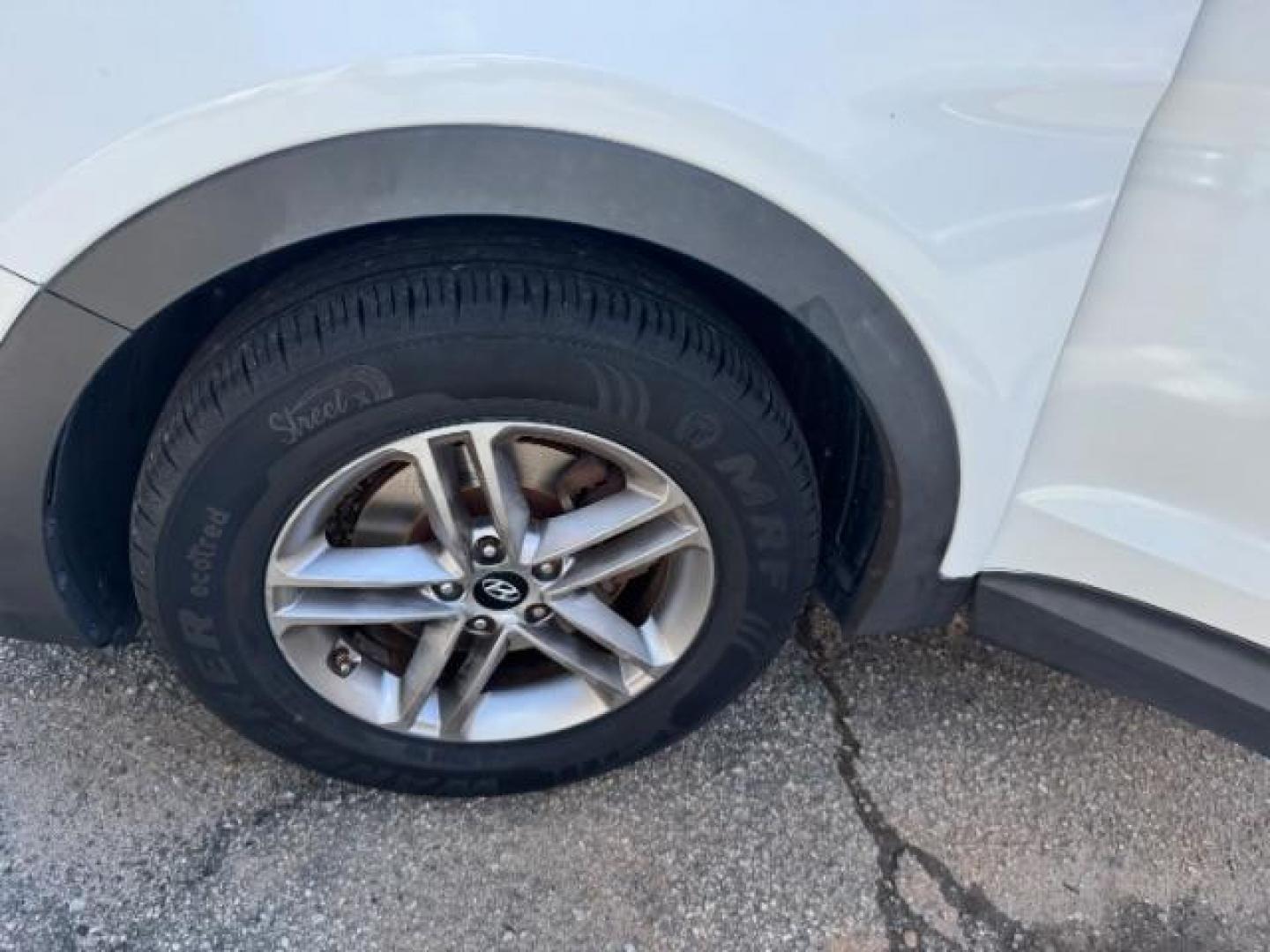 2017 White Hyundai Santa Fe Sport BASE (5NMZU3LB1HH) with an 2.4L I-4 DI DOHC engine, located at 1806 Veterans Memorial Hwy SW, Austell, GA, 30168, (770) 944-9558, 33.817959, -84.606987 - Photo#20
