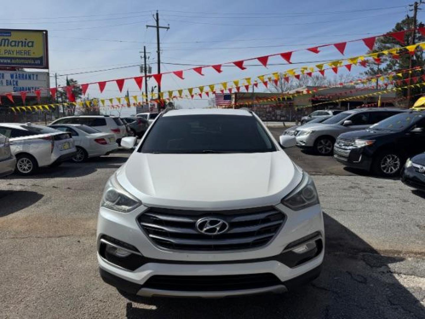 2017 White Hyundai Santa Fe Sport BASE (5NMZU3LB1HH) with an 2.4L I-4 DI DOHC engine, located at 1806 Veterans Memorial Hwy SW, Austell, GA, 30168, (770) 944-9558, 33.817959, -84.606987 - Photo#1