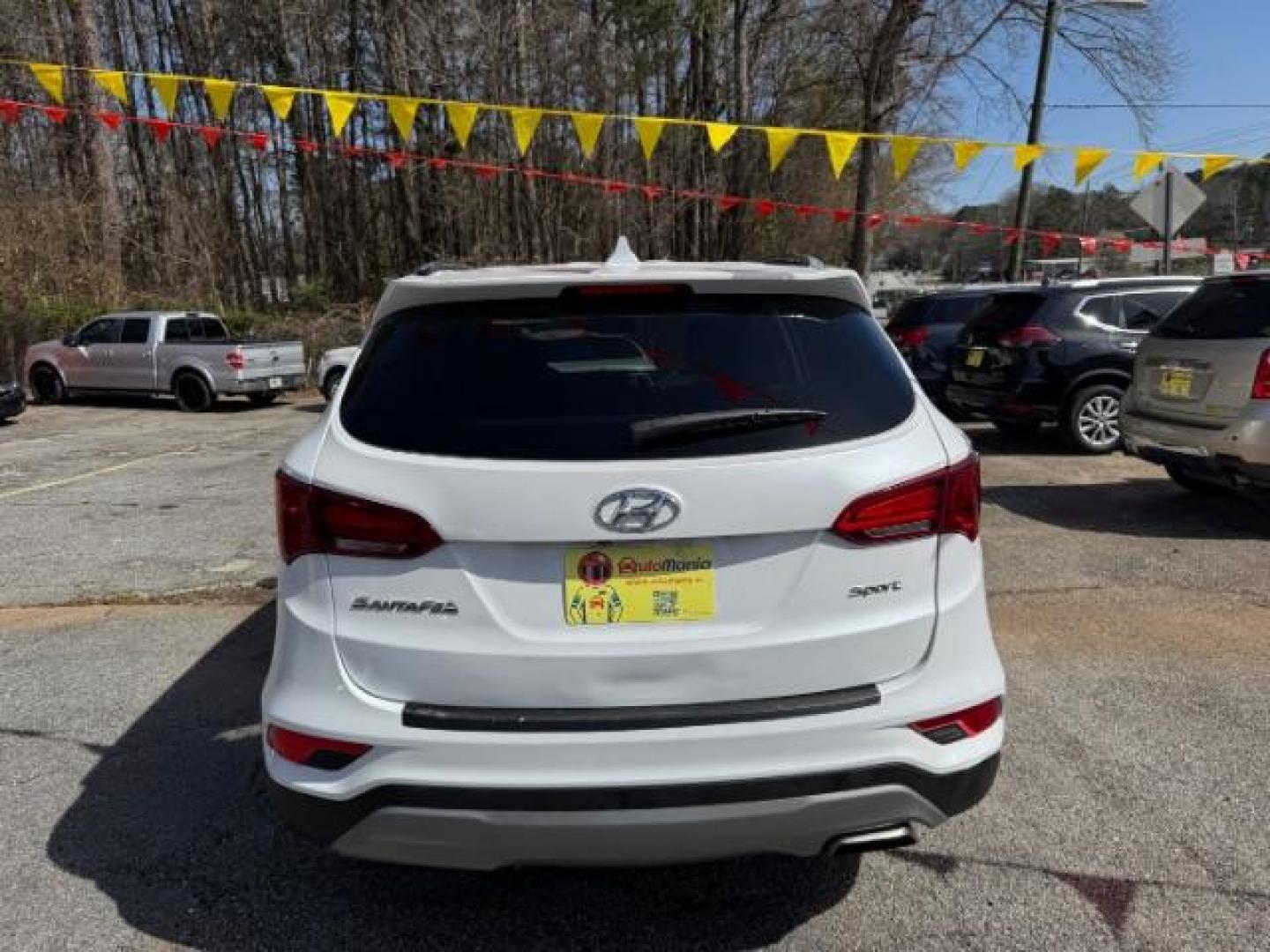2017 White Hyundai Santa Fe Sport BASE (5NMZU3LB1HH) with an 2.4L I-4 DI DOHC engine, located at 1806 Veterans Memorial Hwy SW, Austell, GA, 30168, (770) 944-9558, 33.817959, -84.606987 - Photo#3