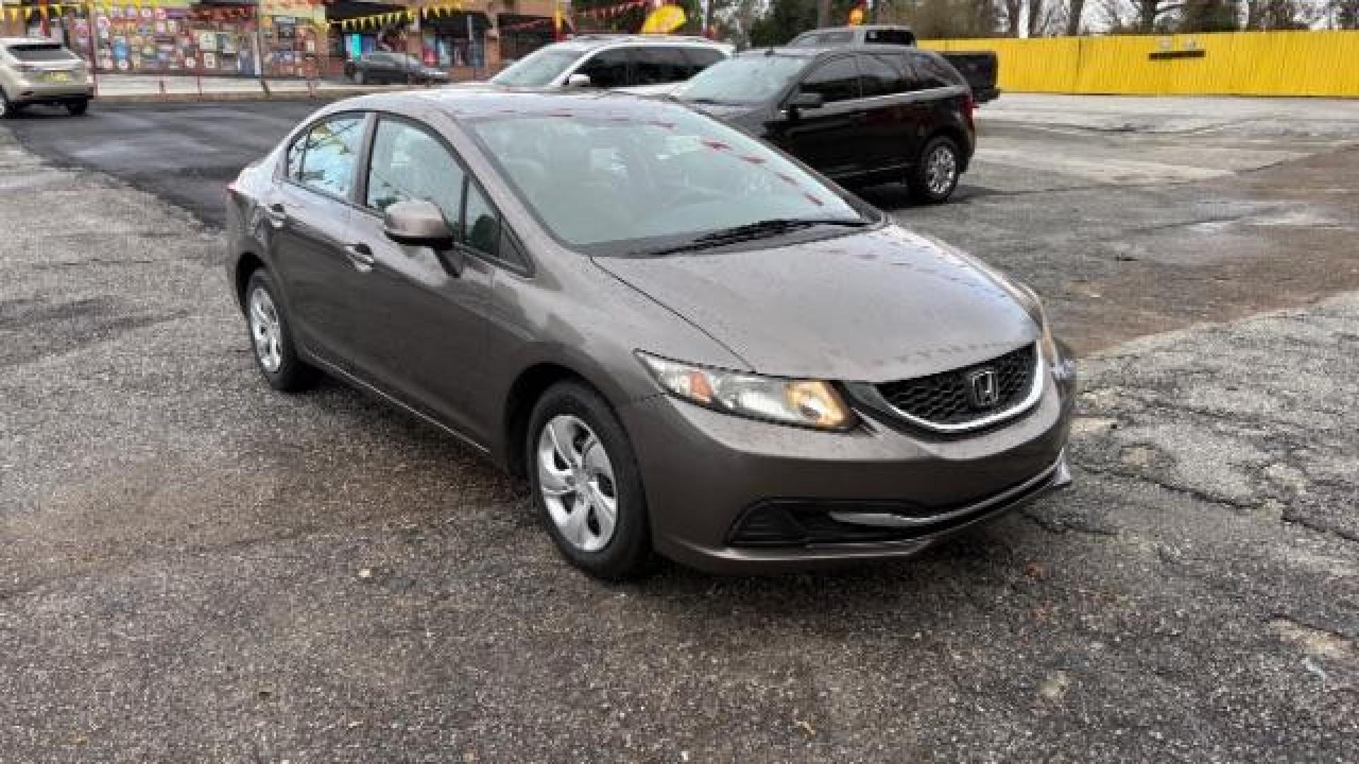 2013 Gray Honda Civic LX (19XFB2F59DE) with an 1.8L I-4 MPI SOHC engine, located at 1806 Veterans Memorial Hwy SW, Austell, GA, 30168, (770) 944-9558, 33.817959, -84.606987 - Photo#2