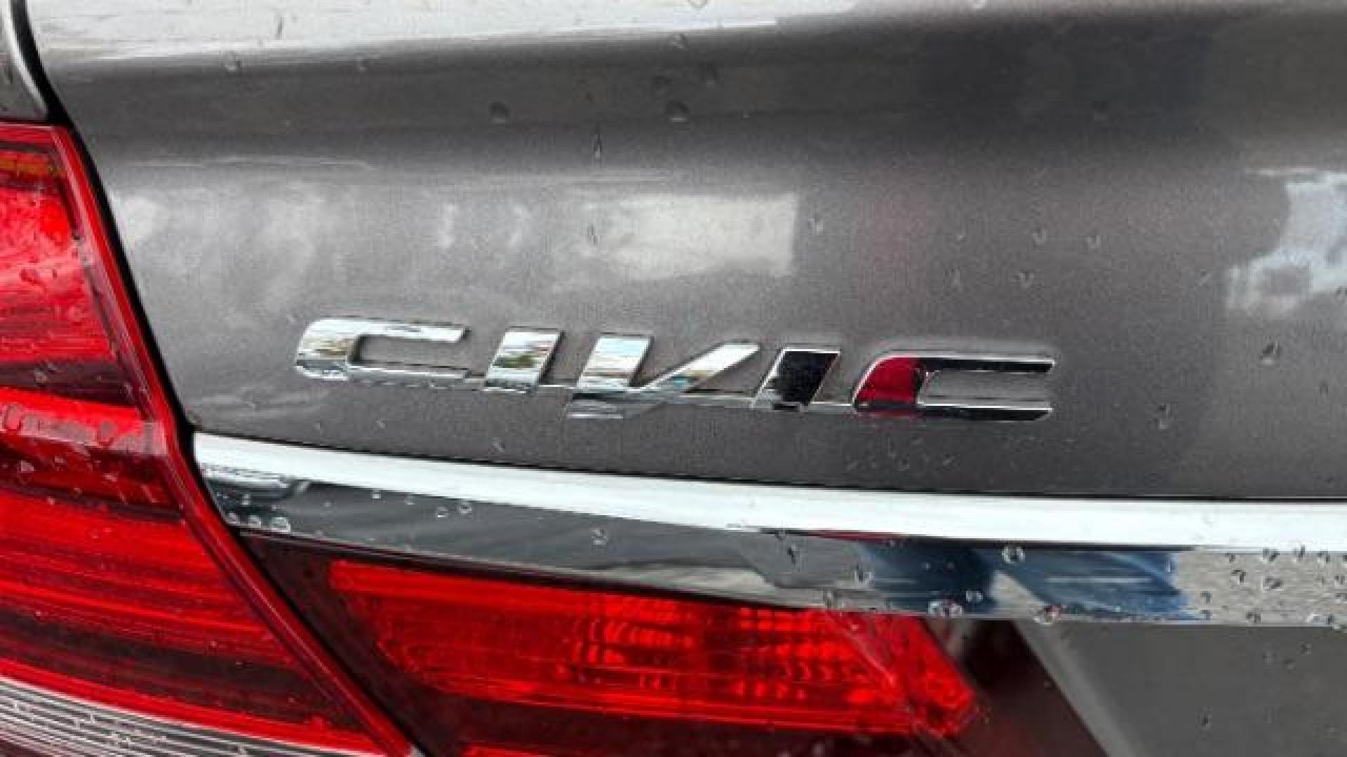 2013 Gray Honda Civic LX (19XFB2F59DE) with an 1.8L I-4 MPI SOHC engine, located at 1806 Veterans Memorial Hwy SW, Austell, GA, 30168, (770) 944-9558, 33.817959, -84.606987 - Photo#7