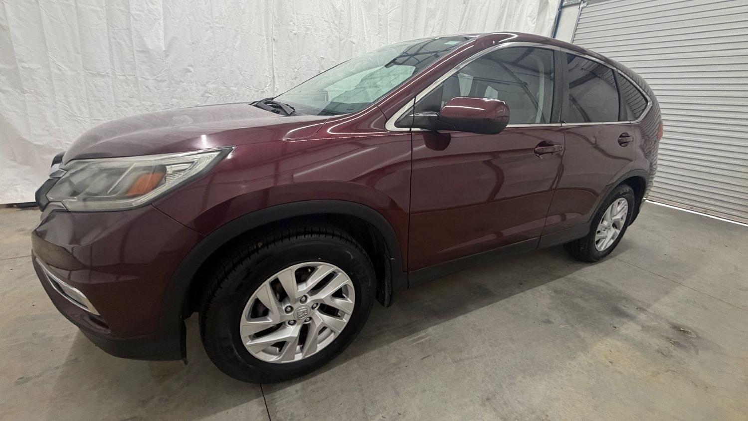 2015 Maroon Honda CR-V EX (2HKRM3H58FH) with an 2.4L I-4 MPI DOHC engine, located at 1806 Veterans Memorial Hwy SW, Austell, GA, 30168, (770) 944-9558, 33.817959, -84.606987- Photo#1