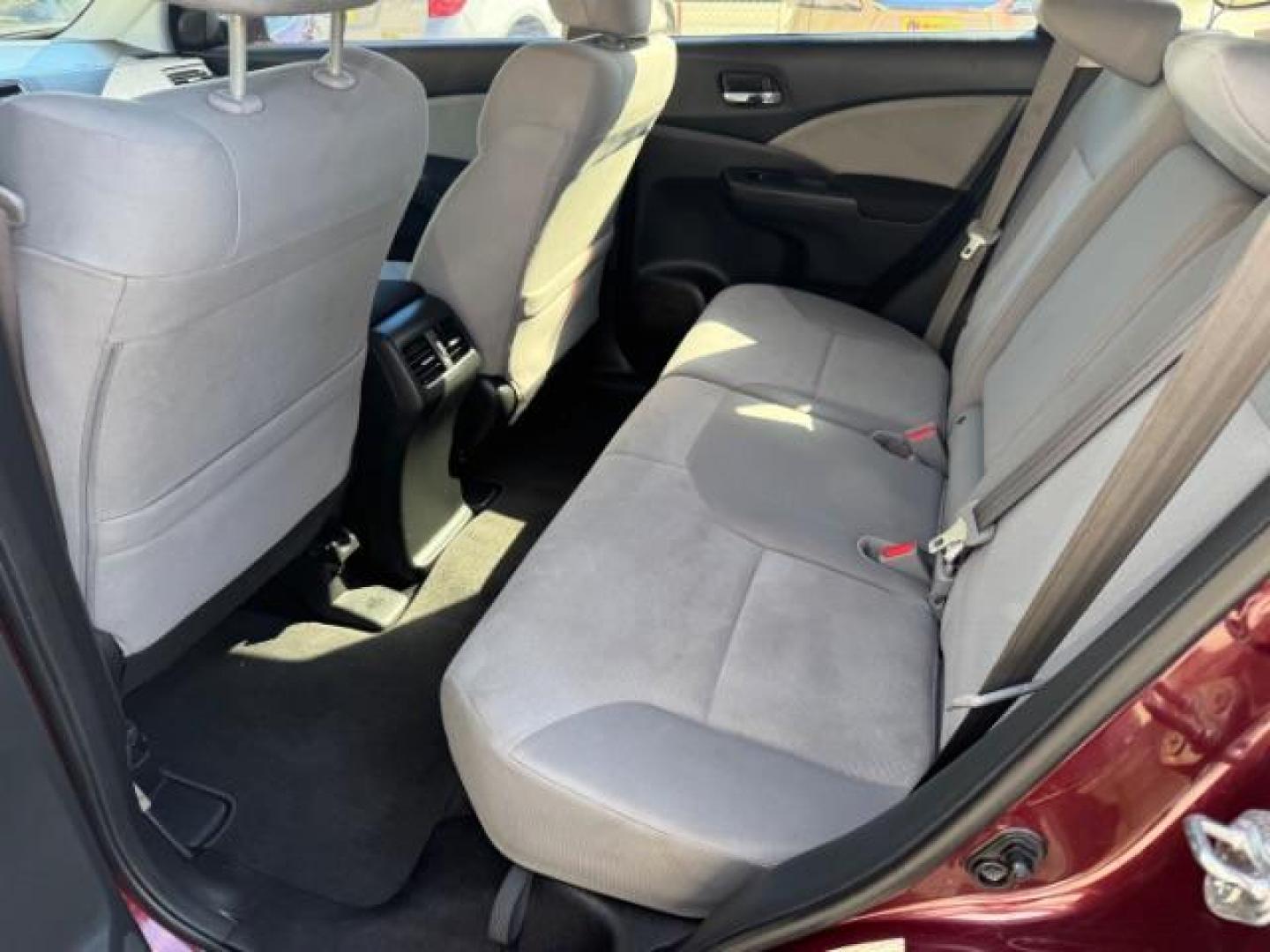 2015 Maroon Honda CR-V EX (2HKRM3H58FH) with an 2.4L I-4 MPI DOHC engine, located at 1806 Veterans Memorial Hwy SW, Austell, GA, 30168, (770) 944-9558, 33.817959, -84.606987 - Photo#9