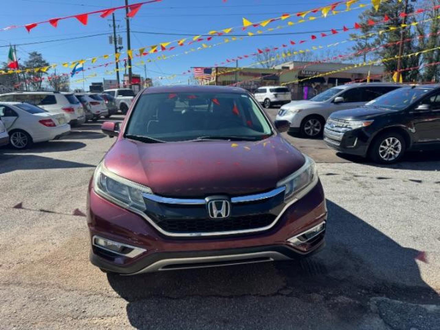 2015 Maroon Honda CR-V EX (2HKRM3H58FH) with an 2.4L I-4 MPI DOHC engine, located at 1806 Veterans Memorial Hwy SW, Austell, GA, 30168, (770) 944-9558, 33.817959, -84.606987 - Photo#0