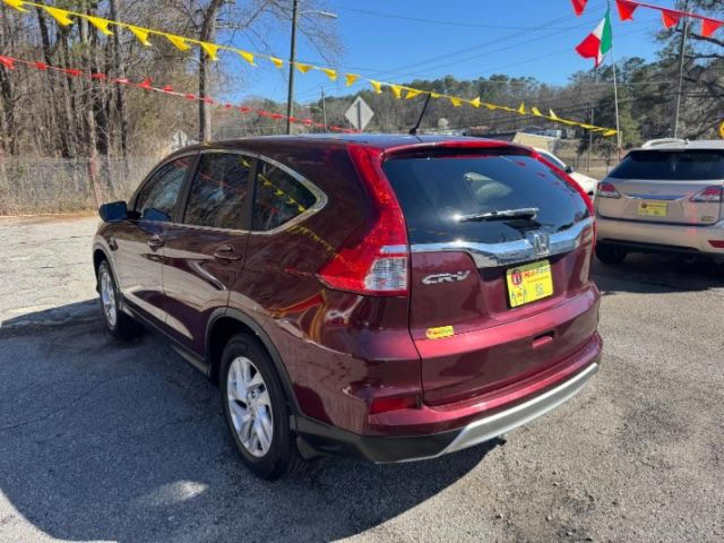 2015 Maroon Honda CR-V EX (2HKRM3H58FH) with an 2.4L I-4 MPI DOHC engine, located at 1806 Veterans Memorial Hwy SW, Austell, GA, 30168, (770) 944-9558, 33.817959, -84.606987 - Photo#5