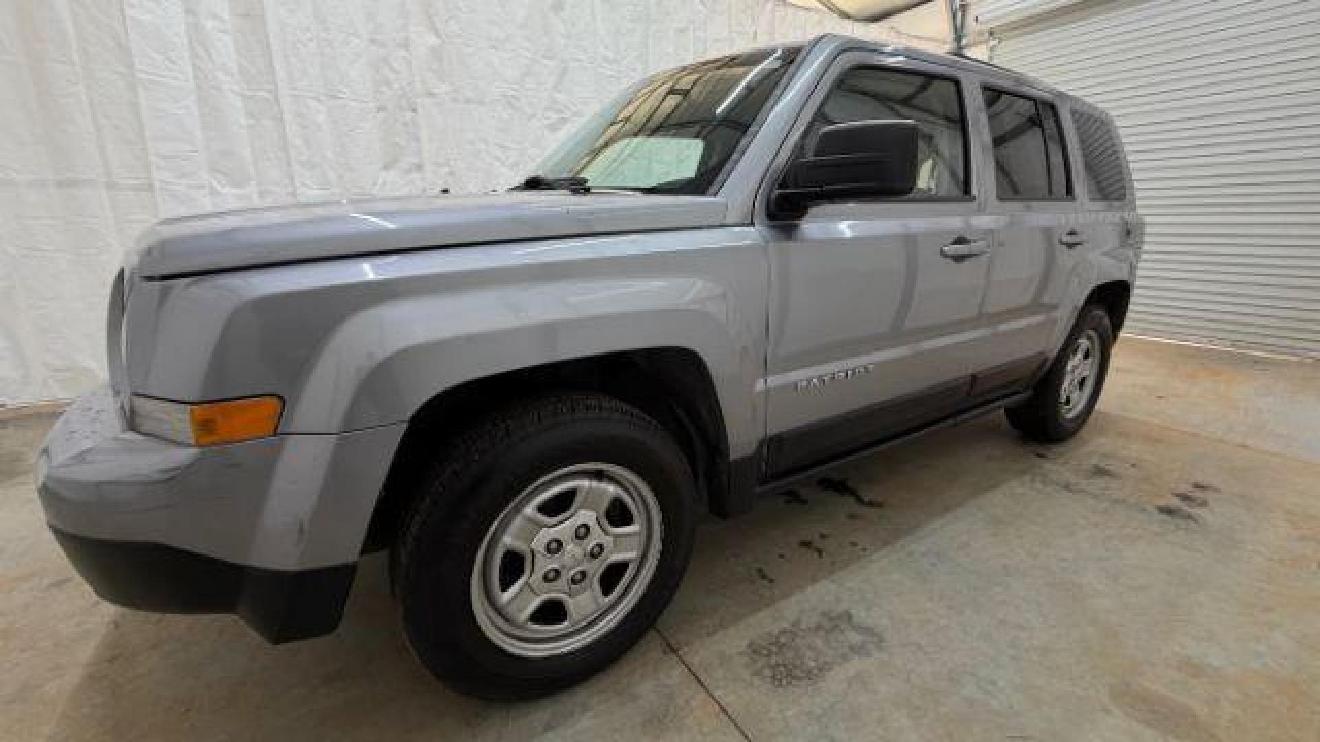 2015 Silver Jeep Patriot Sport (1C4NJPBAXFD) with an 2.0L I-4 SFI DOHC engine, located at 1806 Veterans Memorial Hwy SW, Austell, GA, 30168, (770) 944-9558, 33.817959, -84.606987 - Photo#1