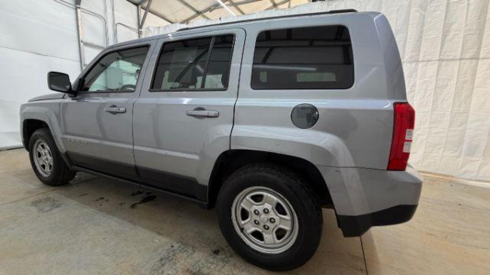 2015 Silver Jeep Patriot Sport (1C4NJPBAXFD) with an 2.0L I-4 SFI DOHC engine, located at 1806 Veterans Memorial Hwy SW, Austell, GA, 30168, (770) 944-9558, 33.817959, -84.606987 - Photo#2