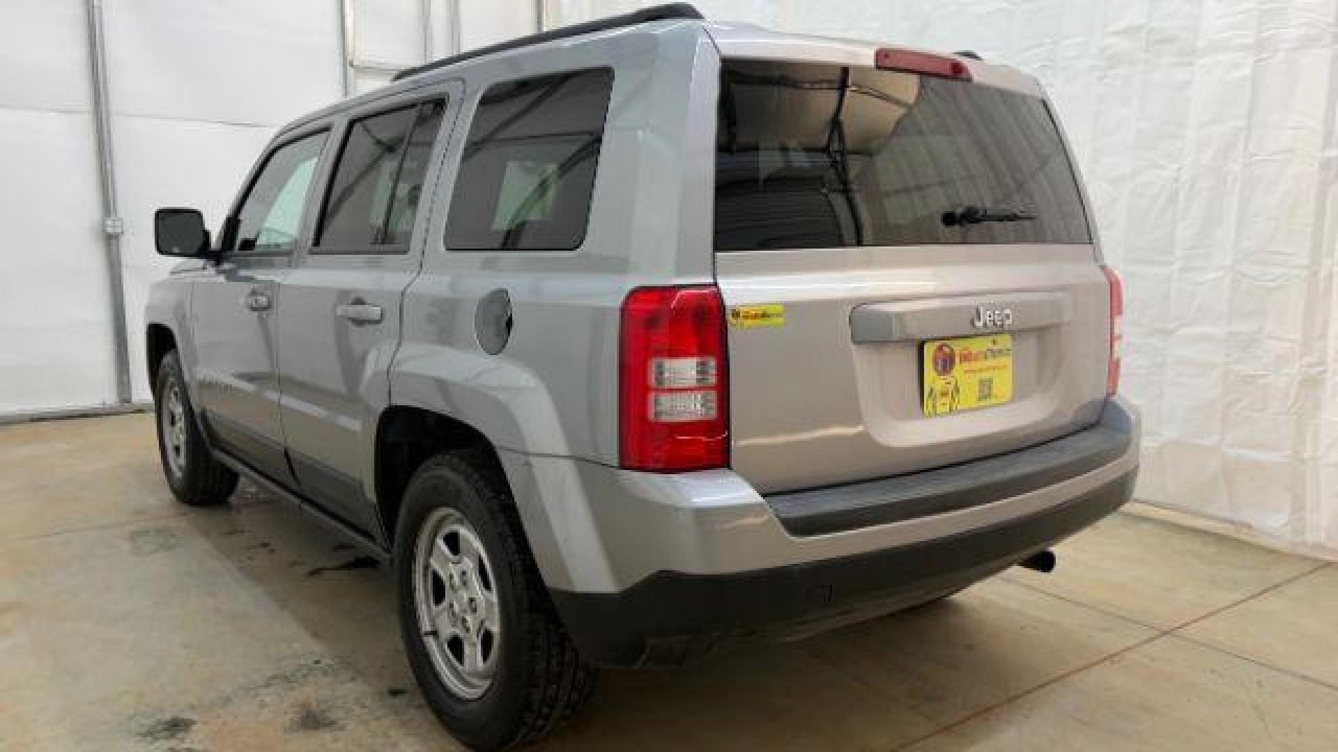2015 Silver Jeep Patriot Sport (1C4NJPBAXFD) with an 2.0L I-4 SFI DOHC engine, located at 1806 Veterans Memorial Hwy SW, Austell, GA, 30168, (770) 944-9558, 33.817959, -84.606987 - Photo#3