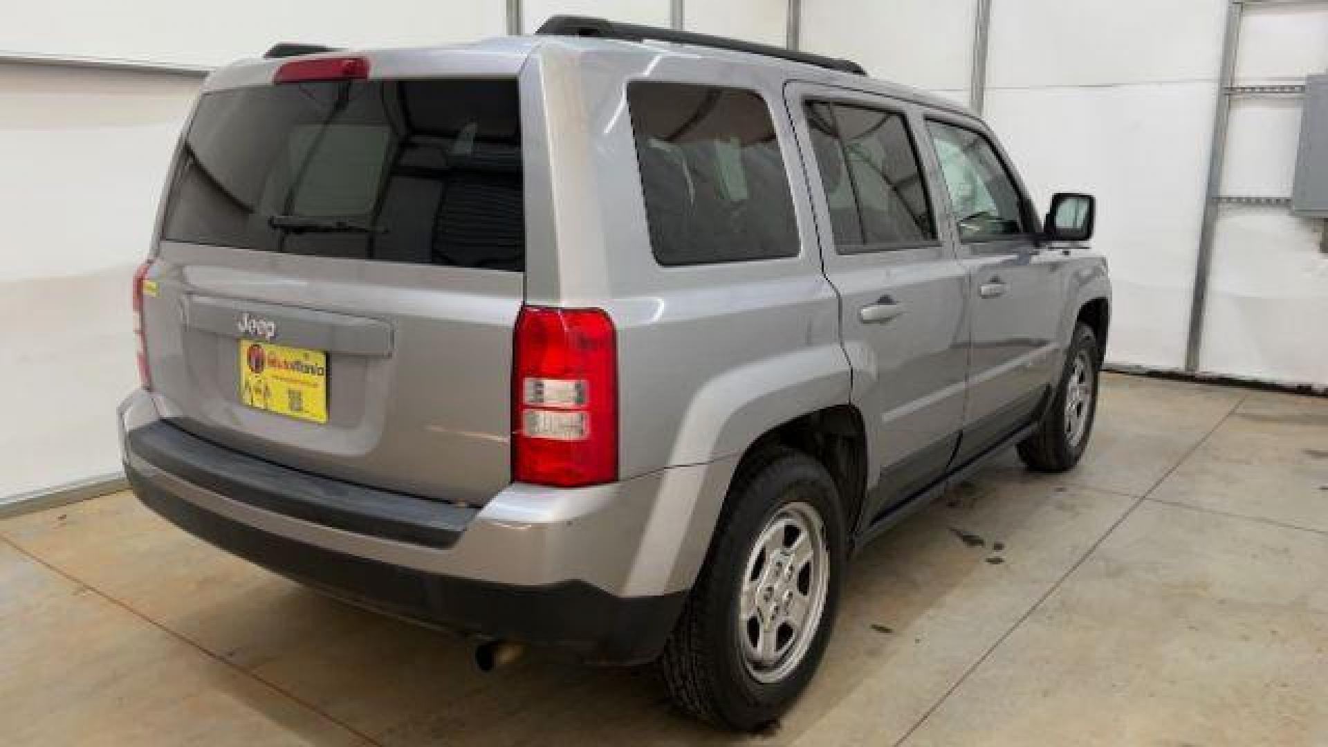 2015 Silver Jeep Patriot Sport (1C4NJPBAXFD) with an 2.0L I-4 SFI DOHC engine, located at 1806 Veterans Memorial Hwy SW, Austell, GA, 30168, (770) 944-9558, 33.817959, -84.606987 - Photo#5