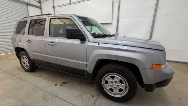2015 Silver Jeep Patriot Sport (1C4NJPBAXFD) with an 2.0L I-4 SFI DOHC engine, located at 1806 Veterans Memorial Hwy SW, Austell, GA, 30168, (770) 944-9558, 33.817959, -84.606987 - Photo#7