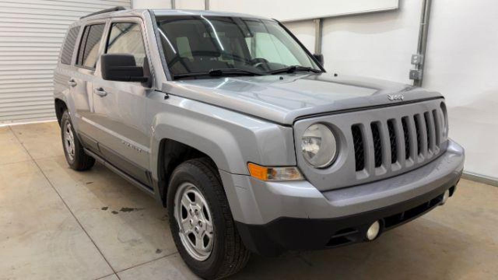 2015 Silver Jeep Patriot Sport (1C4NJPBAXFD) with an 2.0L I-4 SFI DOHC engine, located at 1806 Veterans Memorial Hwy SW, Austell, GA, 30168, (770) 944-9558, 33.817959, -84.606987 - Photo#8