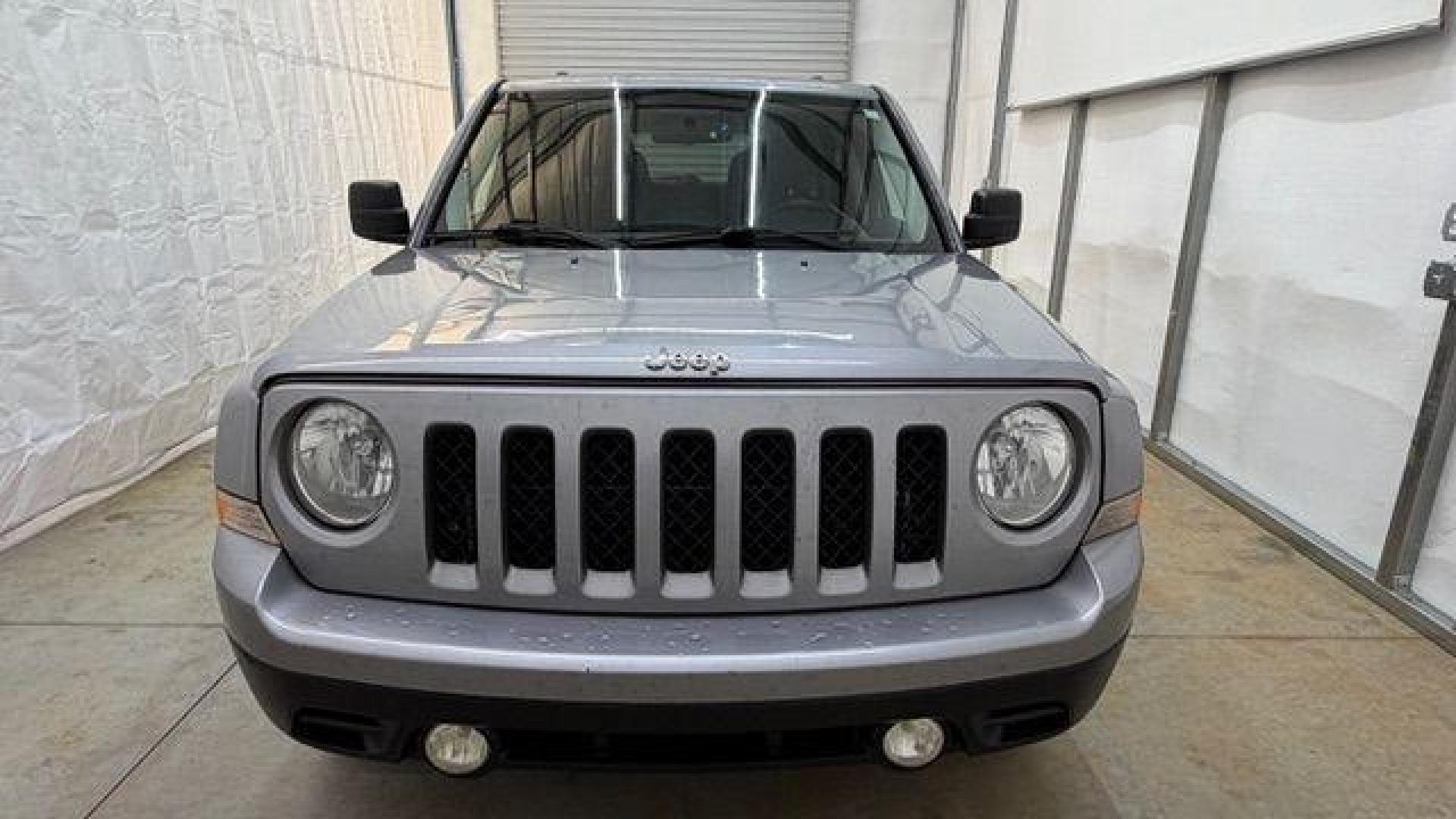 2015 Silver Jeep Patriot Sport (1C4NJPBAXFD) with an 2.0L I-4 SFI DOHC engine, located at 1806 Veterans Memorial Hwy SW, Austell, GA, 30168, (770) 944-9558, 33.817959, -84.606987 - Photo#9