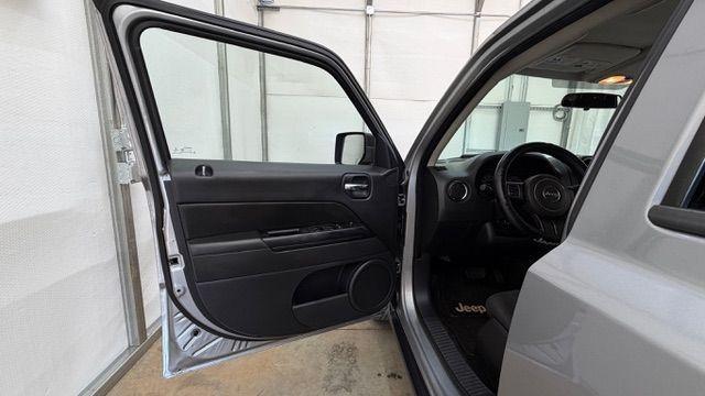 2015 Silver Jeep Patriot Sport (1C4NJPBAXFD) with an 2.0L I-4 SFI DOHC engine, located at 1806 Veterans Memorial Hwy SW, Austell, GA, 30168, (770) 944-9558, 33.817959, -84.606987 - Photo#10