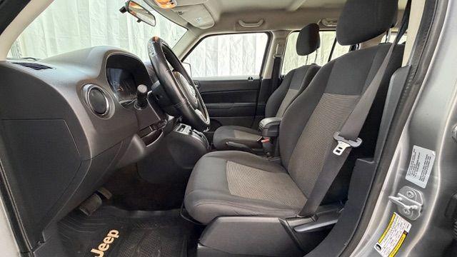 2015 Silver Jeep Patriot Sport (1C4NJPBAXFD) with an 2.0L I-4 SFI DOHC engine, located at 1806 Veterans Memorial Hwy SW, Austell, GA, 30168, (770) 944-9558, 33.817959, -84.606987 - Photo#11