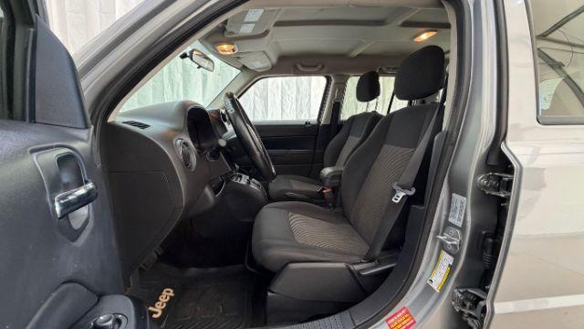 2015 Silver Jeep Patriot Sport (1C4NJPBAXFD) with an 2.0L I-4 SFI DOHC engine, located at 1806 Veterans Memorial Hwy SW, Austell, GA, 30168, (770) 944-9558, 33.817959, -84.606987 - Photo#12