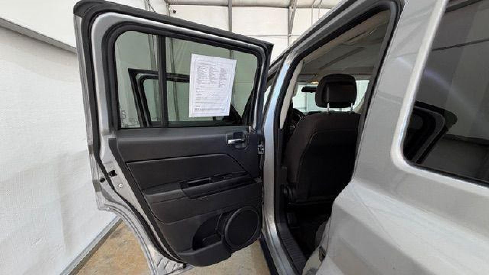 2015 Silver Jeep Patriot Sport (1C4NJPBAXFD) with an 2.0L I-4 SFI DOHC engine, located at 1806 Veterans Memorial Hwy SW, Austell, GA, 30168, (770) 944-9558, 33.817959, -84.606987 - Photo#13