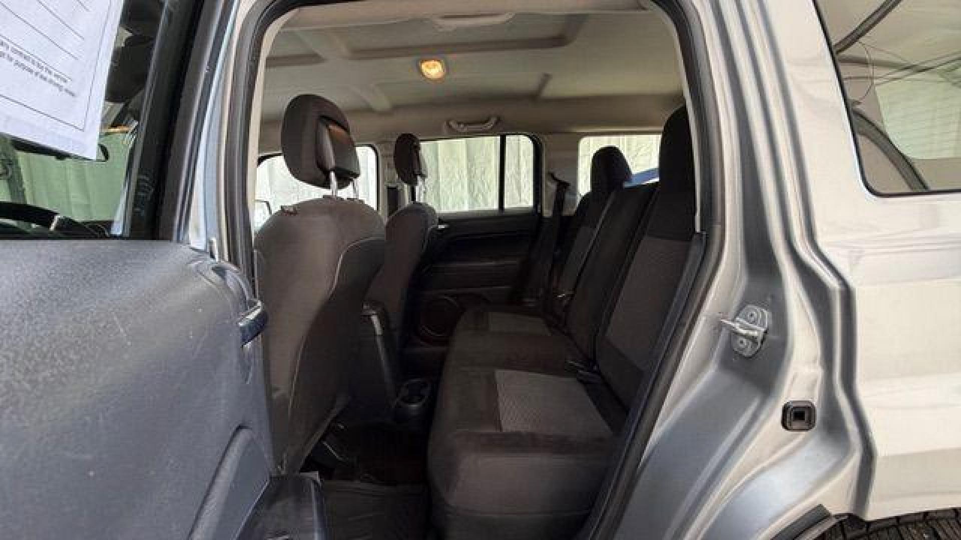 2015 Silver Jeep Patriot Sport (1C4NJPBAXFD) with an 2.0L I-4 SFI DOHC engine, located at 1806 Veterans Memorial Hwy SW, Austell, GA, 30168, (770) 944-9558, 33.817959, -84.606987 - Photo#14