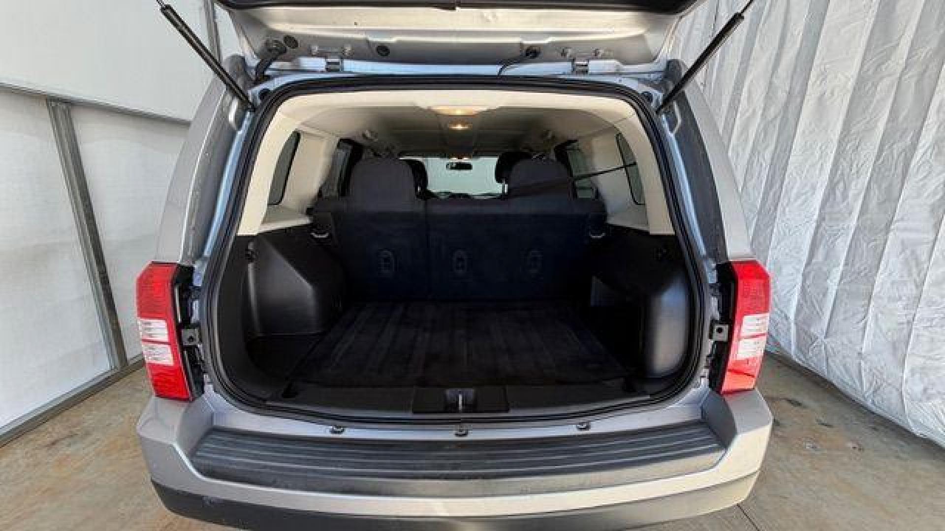 2015 Silver Jeep Patriot Sport (1C4NJPBAXFD) with an 2.0L I-4 SFI DOHC engine, located at 1806 Veterans Memorial Hwy SW, Austell, GA, 30168, (770) 944-9558, 33.817959, -84.606987 - Photo#16