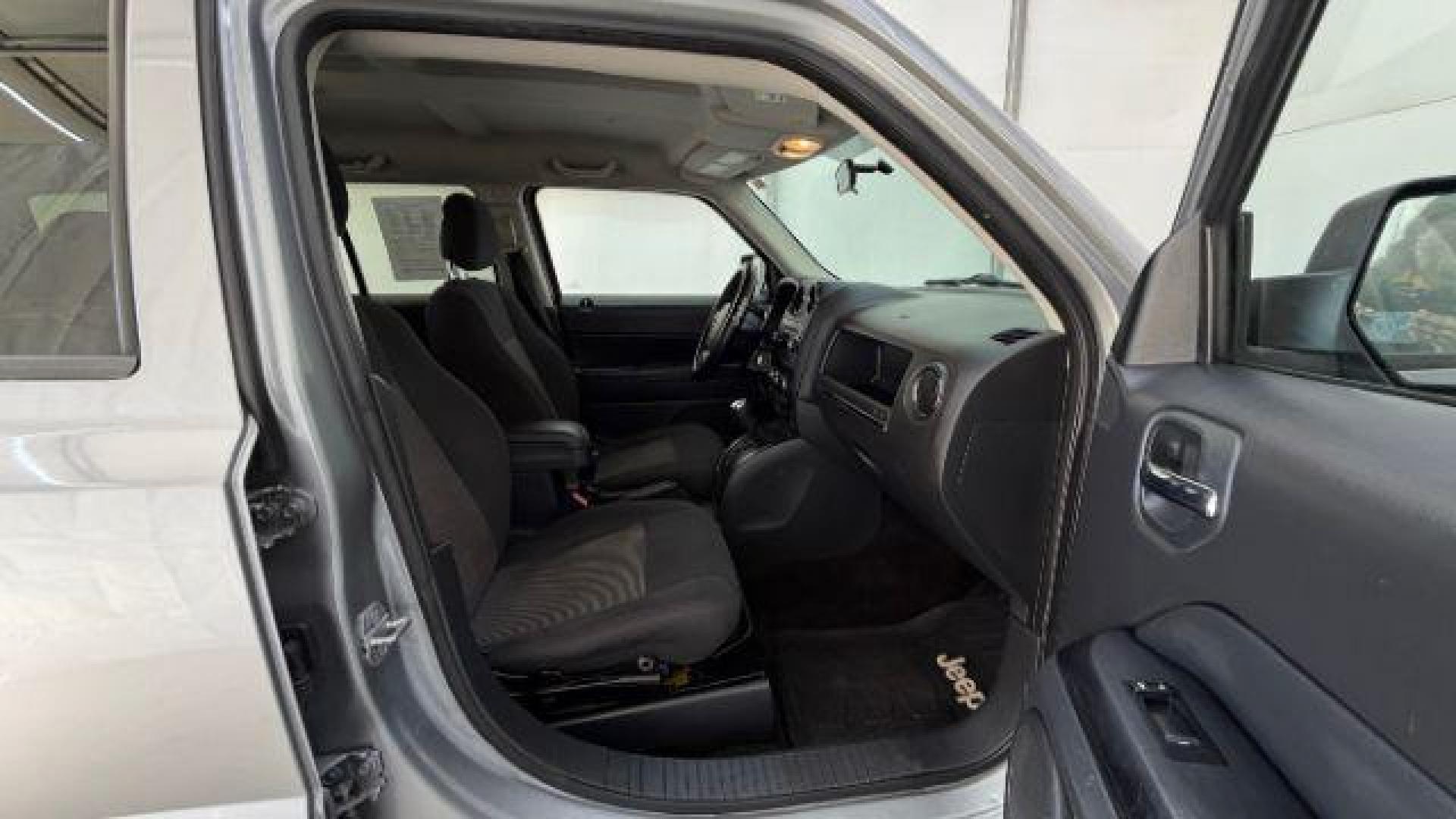 2015 Silver Jeep Patriot Sport (1C4NJPBAXFD) with an 2.0L I-4 SFI DOHC engine, located at 1806 Veterans Memorial Hwy SW, Austell, GA, 30168, (770) 944-9558, 33.817959, -84.606987 - Photo#18