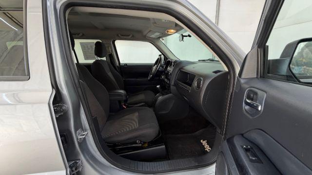 2015 Silver Jeep Patriot Sport (1C4NJPBAXFD) with an 2.0L I-4 SFI DOHC engine, located at 1806 Veterans Memorial Hwy SW, Austell, GA, 30168, (770) 944-9558, 33.817959, -84.606987 - Photo#18