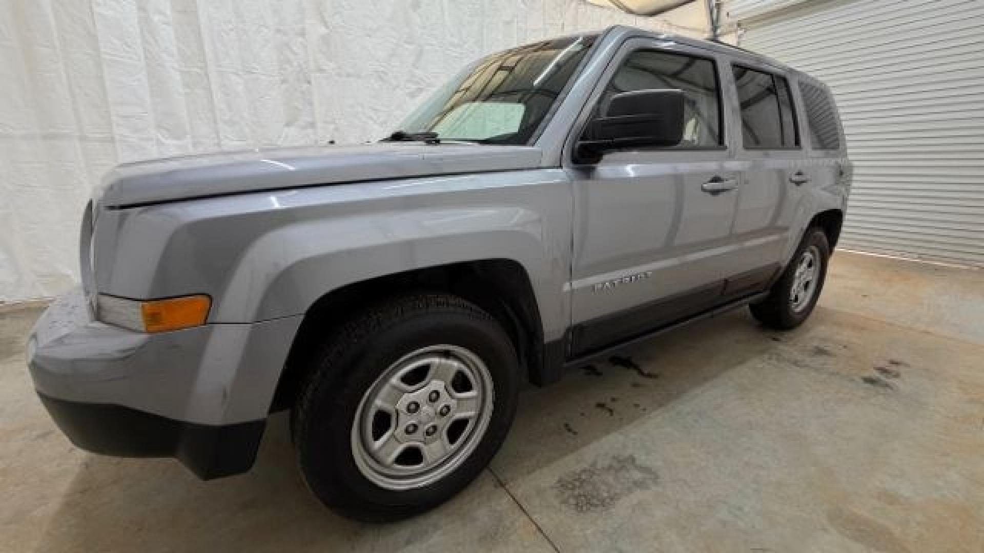 2015 Silver Jeep Patriot Sport (1C4NJPBAXFD) with an 2.0L I-4 SFI DOHC engine, located at 1806 Veterans Memorial Hwy SW, Austell, GA, 30168, (770) 944-9558, 33.817959, -84.606987 - Photo#1