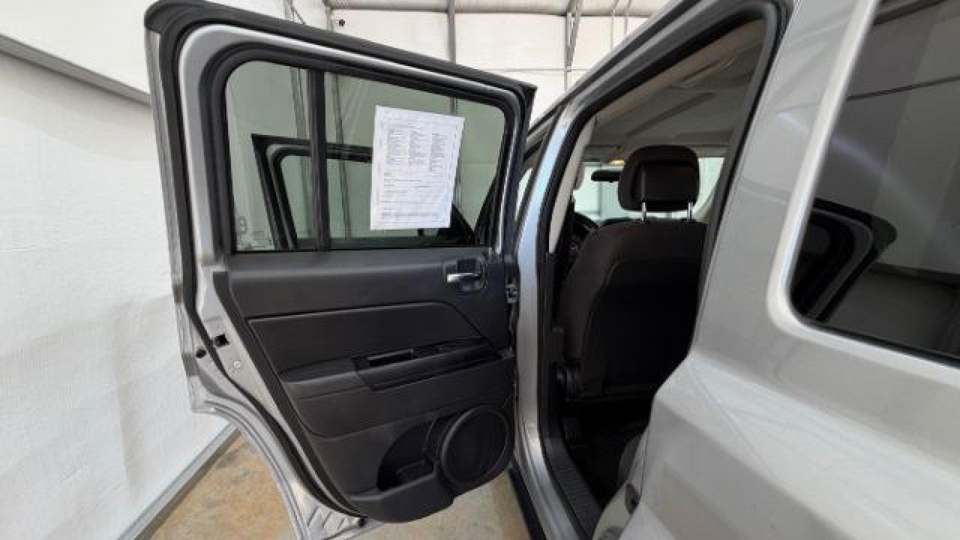 2015 Silver Jeep Patriot Sport (1C4NJPBAXFD) with an 2.0L I-4 SFI DOHC engine, located at 1806 Veterans Memorial Hwy SW, Austell, GA, 30168, (770) 944-9558, 33.817959, -84.606987 - Photo#13