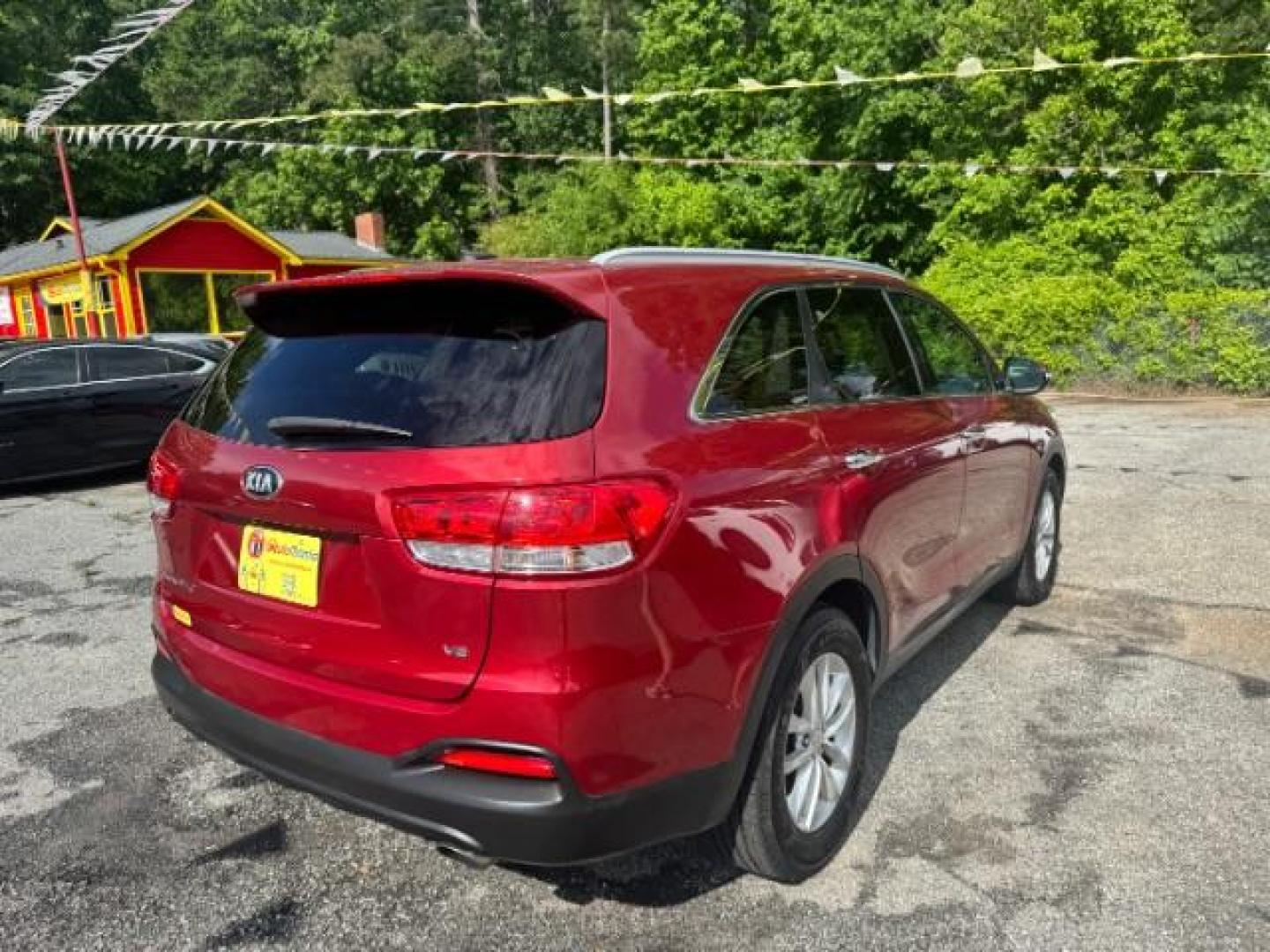 2017 Red Kia Sorento 3.3L LX (5XYPG4A51HG) with an Lambda II 3.3L V-6 gasoline direct injection engine, located at 1806 Veterans Memorial Hwy SW, Austell, GA, 30168, (770) 944-9558, 33.817959, -84.606987 - Photo#3
