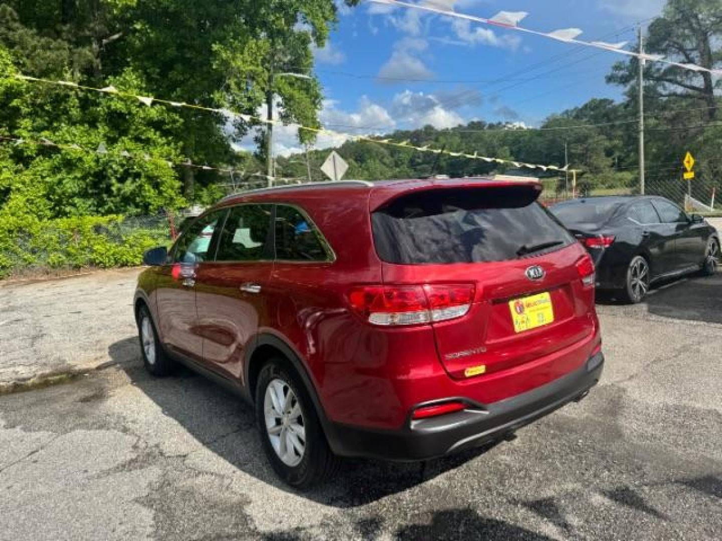 2017 Red Kia Sorento 3.3L LX (5XYPG4A51HG) with an Lambda II 3.3L V-6 gasoline direct injection engine, located at 1806 Veterans Memorial Hwy SW, Austell, GA, 30168, (770) 944-9558, 33.817959, -84.606987 - Photo#5
