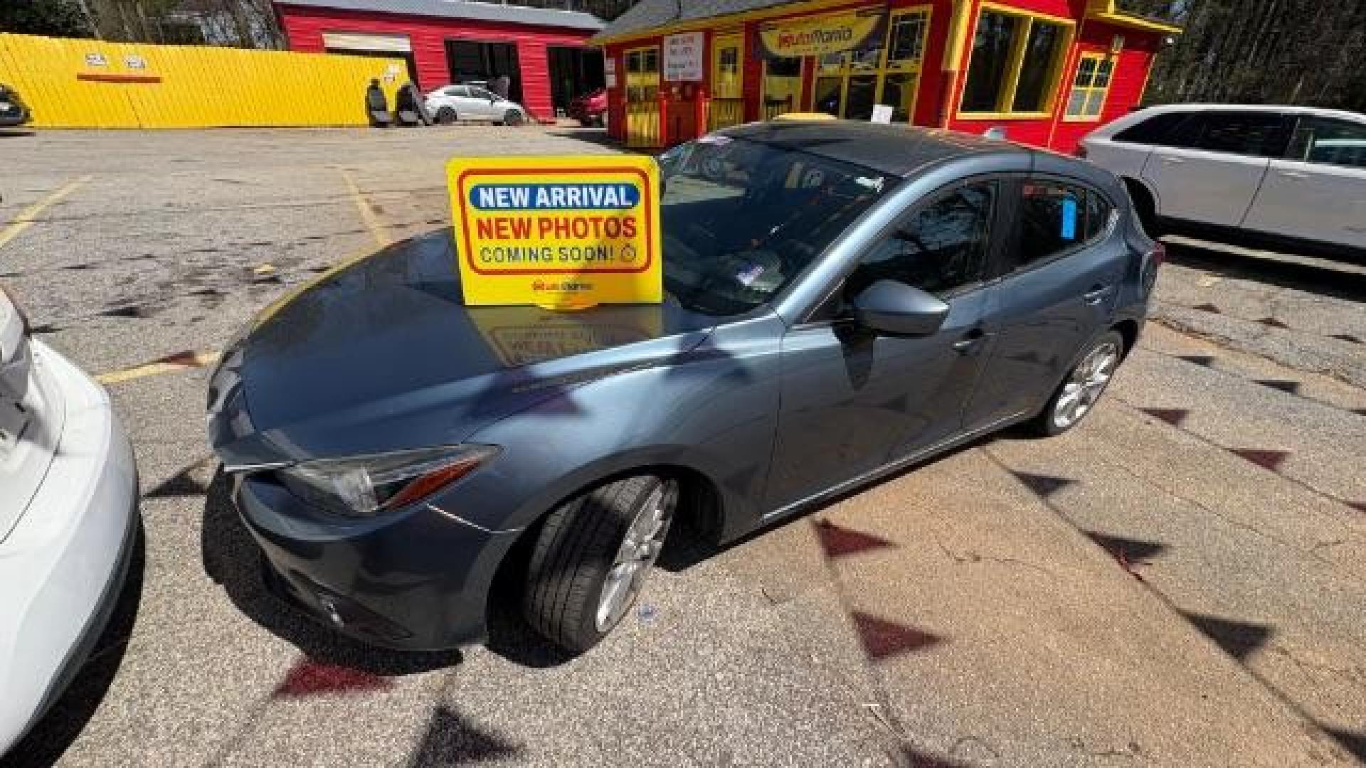 2014 Blue Mazda Mazda3 Hatchback s Touring (JM1BM1L3XE1) with an SKYACTIV-G 2.5L I-4 gasoline direct injection engine, located at 1806 Veterans Memorial Hwy SW, Austell, GA, 30168, (770) 944-9558, 33.817959, -84.606987 - Photo#0
