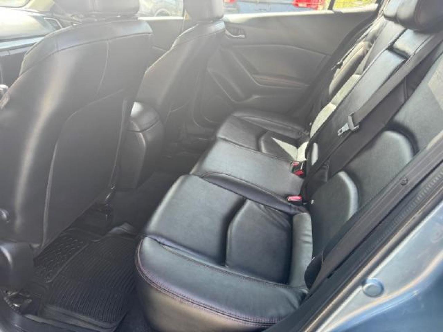 2014 Blue Mazda Mazda3 Hatchback s Touring (JM1BM1L3XE1) with an SKYACTIV-G 2.5L I-4 gasoline direct injection engine, located at 1806 Veterans Memorial Hwy SW, Austell, GA, 30168, (770) 944-9558, 33.817959, -84.606987 - Photo#8