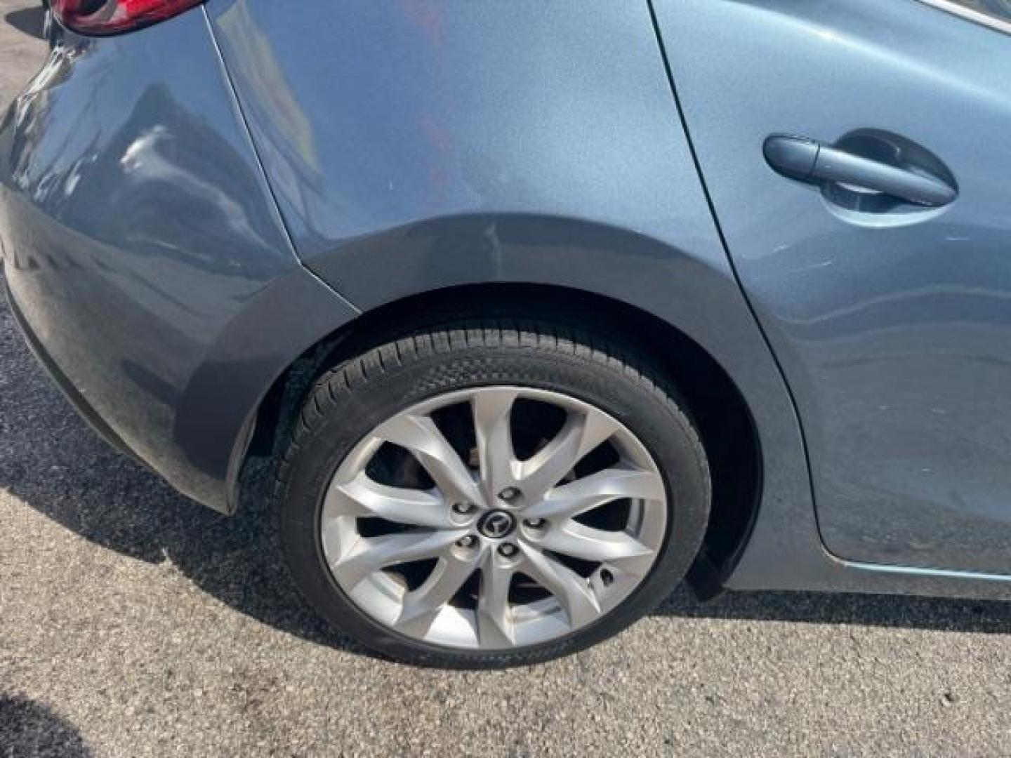2014 Blue Mazda Mazda3 Hatchback s Touring (JM1BM1L3XE1) with an SKYACTIV-G 2.5L I-4 gasoline direct injection engine, located at 1806 Veterans Memorial Hwy SW, Austell, GA, 30168, (770) 944-9558, 33.817959, -84.606987 - Photo#20