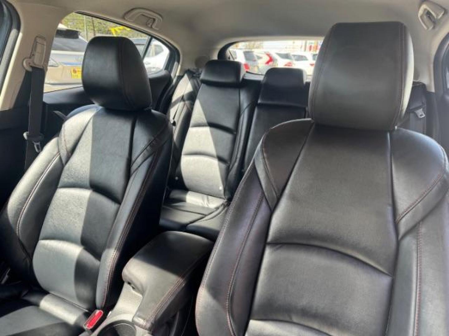 2014 Blue Mazda Mazda3 Hatchback s Touring (JM1BM1L3XE1) with an SKYACTIV-G 2.5L I-4 gasoline direct injection engine, located at 1806 Veterans Memorial Hwy SW, Austell, GA, 30168, (770) 944-9558, 33.817959, -84.606987 - Photo#7