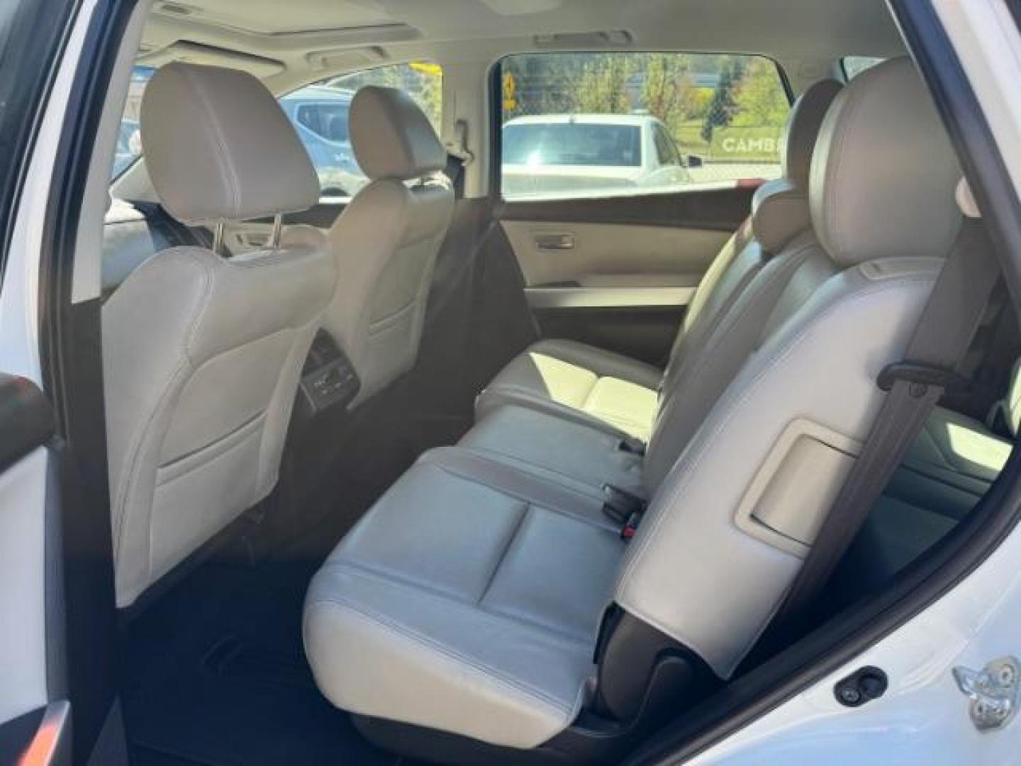2014 White Mazda CX-9 Grand Touring (JM3TB2DA8E0) with an 3.7L V-6 DOHC engine, located at 1806 Veterans Memorial Hwy SW, Austell, GA, 30168, (770) 944-9558, 33.817959, -84.606987 - Photo#9