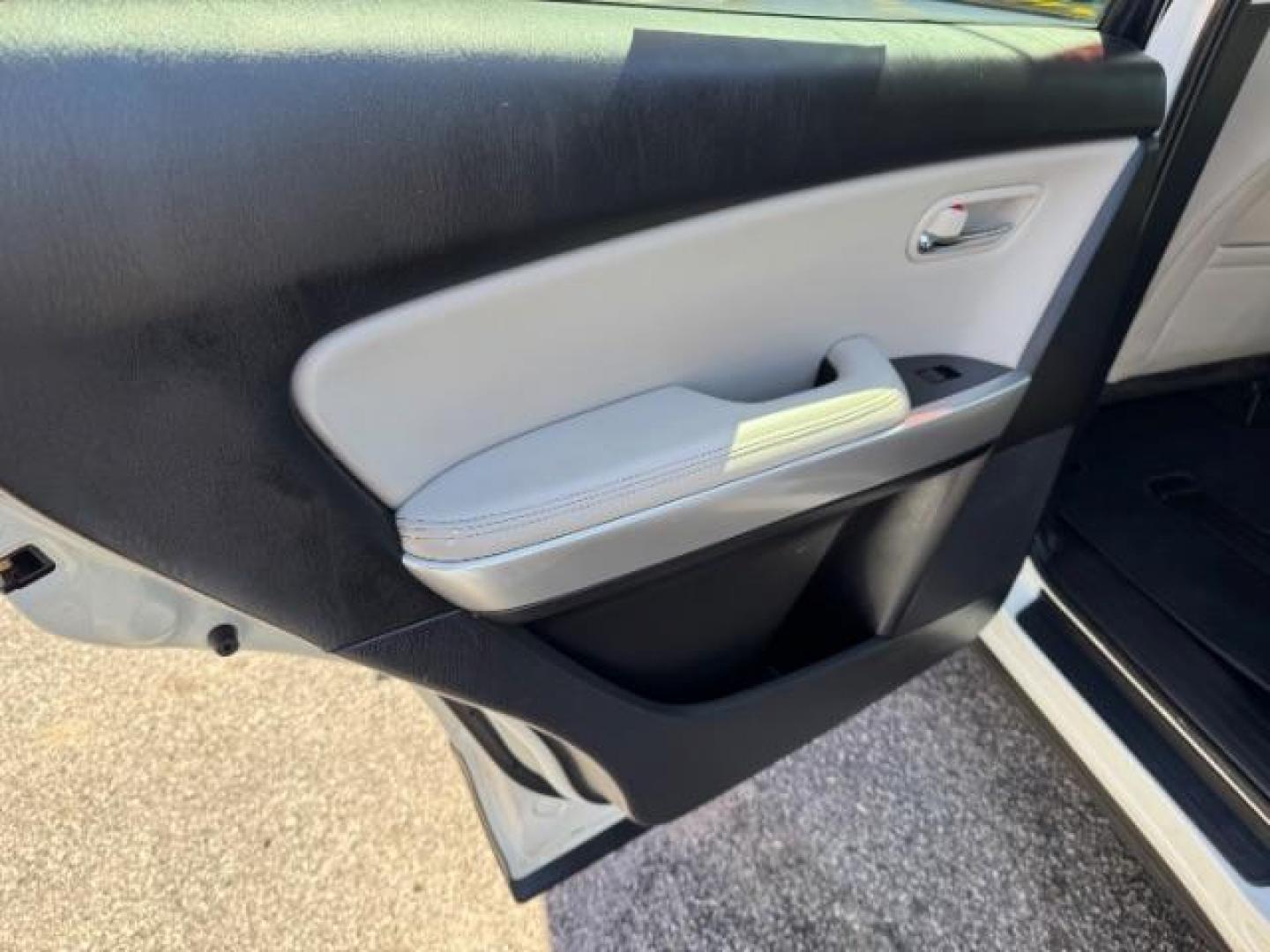 2014 White Mazda CX-9 Grand Touring (JM3TB2DA8E0) with an 3.7L V-6 DOHC engine, located at 1806 Veterans Memorial Hwy SW, Austell, GA, 30168, (770) 944-9558, 33.817959, -84.606987 - Photo#10