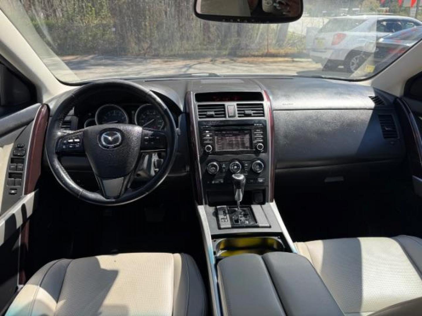 2014 White Mazda CX-9 Grand Touring (JM3TB2DA8E0) with an 3.7L V-6 DOHC engine, located at 1806 Veterans Memorial Hwy SW, Austell, GA, 30168, (770) 944-9558, 33.817959, -84.606987 - Photo#11